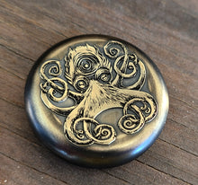 Load image into Gallery viewer, Prescience- A brass worry coin, engraved with a mystic octopus
